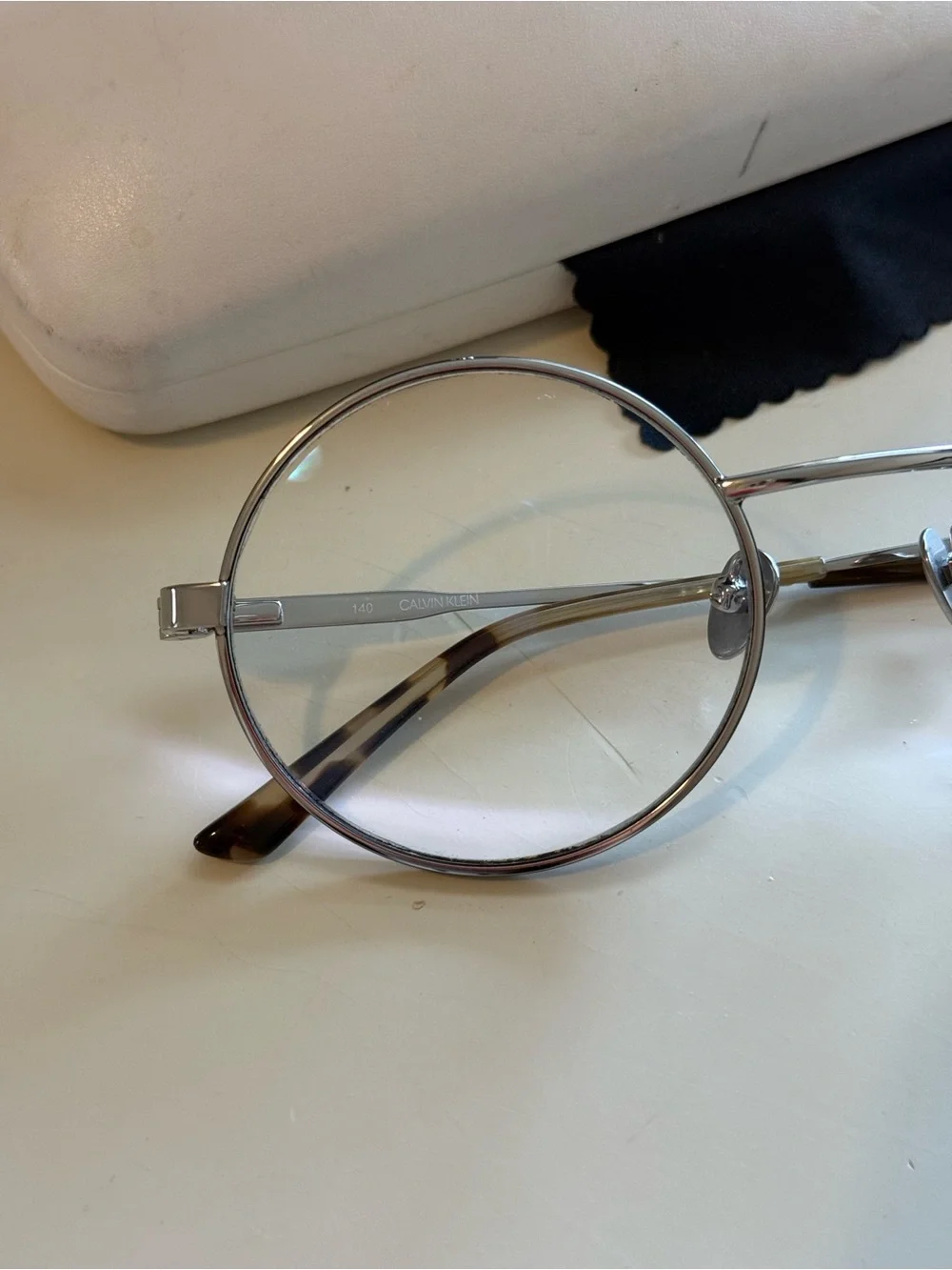 Calvin Klein Silver Round Metal Eyeglasses with Tortoiseshell Temples